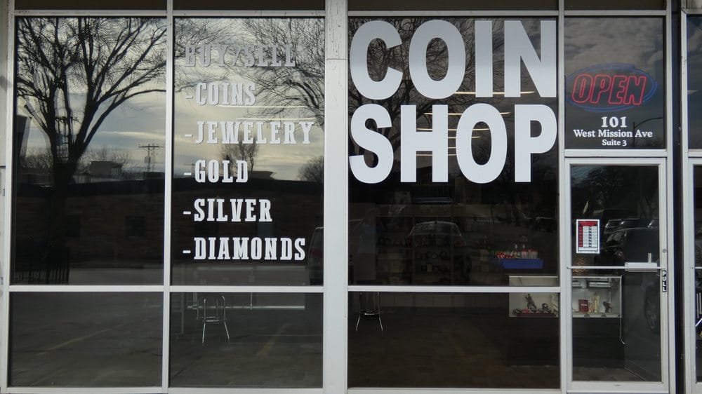 Gold and silver bullion bars and coins displayed at Gold & Silver Trading Post in Bellevue, Nebraska